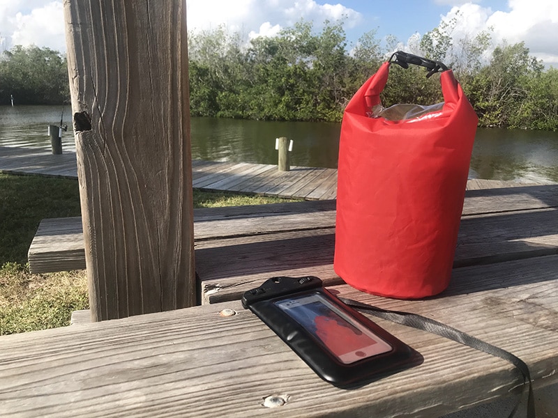 Dry bag for paddle board fishing setup