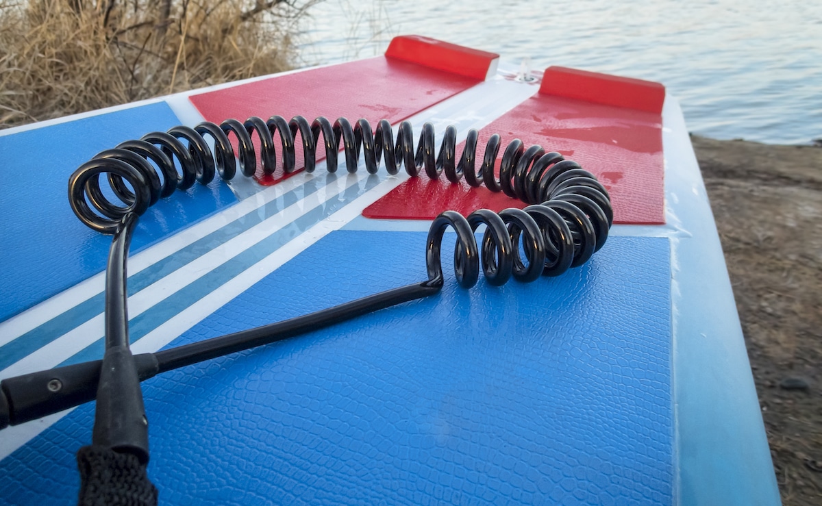 coil safety leash on paddleboard