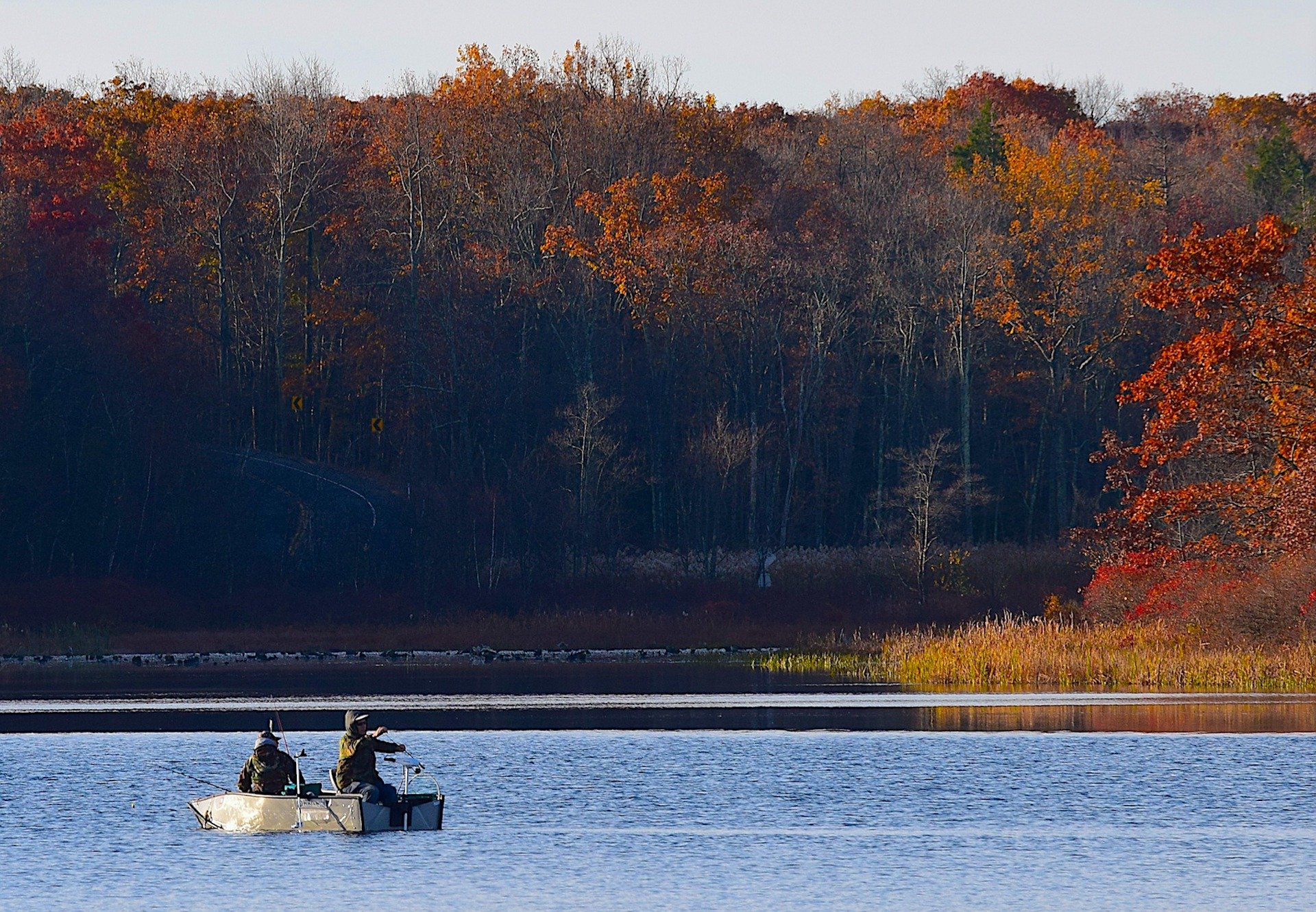 two anglers fishing on a lake