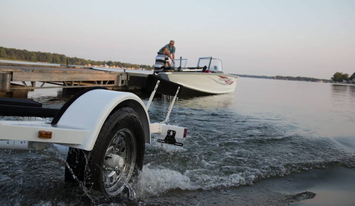 Launching boat trailer in water